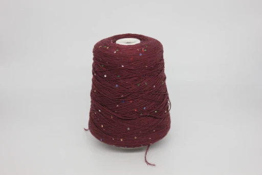 Бобинная пряжа PAILLETTES MERINO пайетки 3 мм (93% меринос, 7% пэ), 420-370м/100 гр, 84777 бордо 370м/100гр